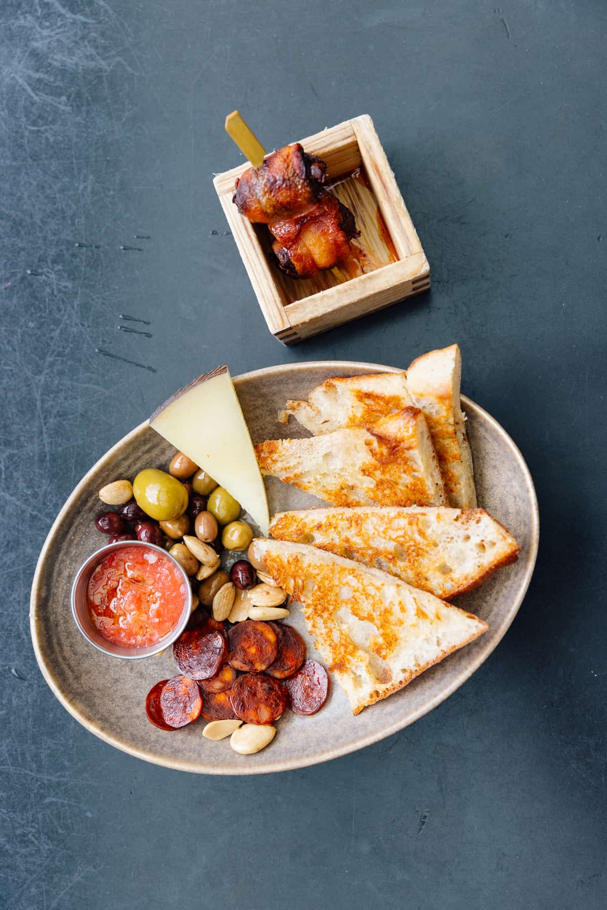 Ultreia's charcuterie board- the pan con tomate, chorizo picante, manchego & marinated olives